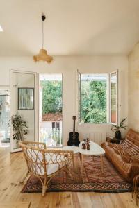 Maisons de vacances Charmante petite maison avec piscine : photos des chambres