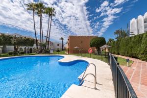 Renovated apartment on beachside with pool