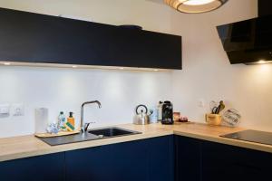 Appartements La Bibliotheque - Les Demeures d-Adrien : photos des chambres