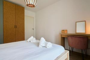 Appartements La Bibliotheque - Les Demeures d-Adrien : photos des chambres