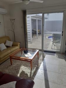 IREMIA, a Peaceful 2-Bed Apartment with Pool, beneath our Private Villa