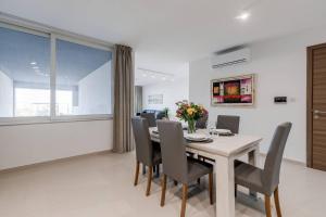 Beachfront 9ten11 Maisonette w Terrace by Homely