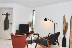 Appartements La Source - Spacieux T2 au coeur du village, a 5min des plages : photos des chambres