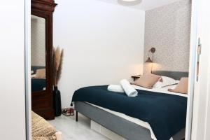 Appartements La Source - Spacieux T2 au coeur du village, a 5min des plages : photos des chambres