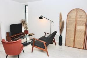 Appartements La Source - Spacieux T2 au coeur du village, a 5min des plages : photos des chambres