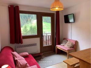 Confortable T2 avec coin nuit pour 4 au Grand-Bornand - FR-1-458-203