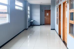 Karins Guesthouse Syariah RedPartner