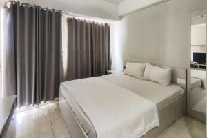 Redliving Margonda Residence 3 Apartemen by Niki Room