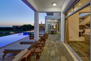 Seafront Villa Kyma by Ezoria Villas