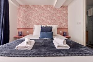 Appartements Le Madeleine chez les M by Primo C0nciergerie : photos des chambres