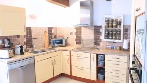 Maisons de vacances Maison avec Jacuzzi et terrasse sur les toits : photos des chambres