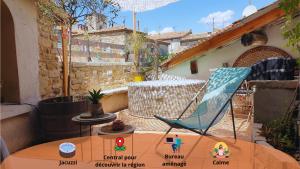 Maisons de vacances Maison avec Jacuzzi et terrasse sur les toits : photos des chambres