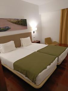 Twin Room with Balcony room in Hotel Porto Santo & Spa