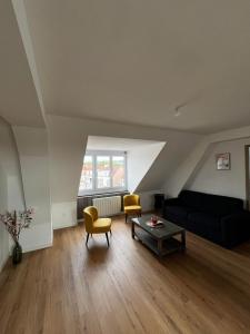 Appartements Loft moderne dominant la ville : photos des chambres