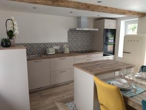 Maisons de vacances Gite Le dorm-eure du Val - SPA : photos des chambres