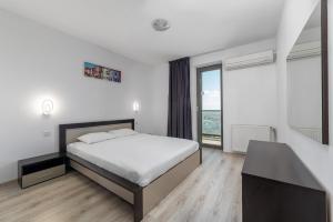 Two-Bedroom Apartment with Balcony room in Monaco Grand Apartments