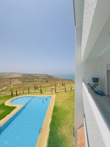 Marina golf 1 chambre vue piscine et partie mer