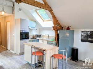 Appartements Les Charmes - Climatisation - Terrasse - Nature : photos des chambres