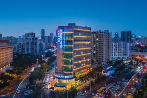 Echarm Hotel Haikou Friendship Sunshine City Qiaozhong Road Branch - 3hvězdičkové hotely ve městě Chaj-kchou