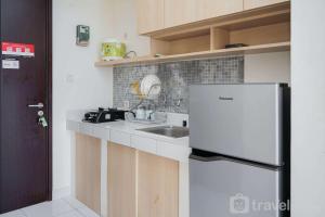 Comfy and Elegant Studio Apartment at Casa De Parco By Travelio