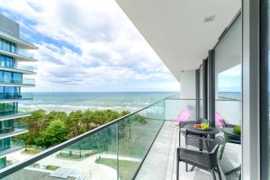 Your Holidays Waves Magia zachodów Słońca E782