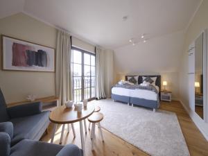 Reetland am Meer Premium Reetdachvilla mit 3 Schlafzimmern, Sauna und Kamin H13