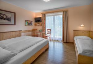 Superior Triple Room room in JUFA Hotel Gitschtal