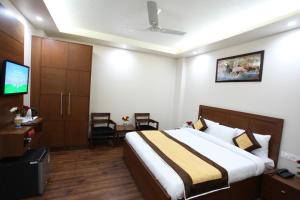 Hotel HC Grand near Indraprastha Apollo Hospital