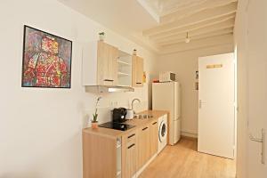 Appart Faubourg St Denis 4 personnes