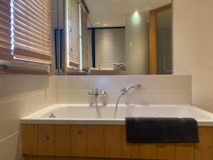 Appartements appartement 103m2 pres de Megeve, face a telecabine la Princesse,2 chambres , garage, local a ski : photos des chambres