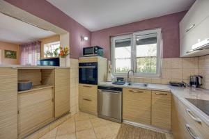 Four-Bedroom Apartment Magnolija