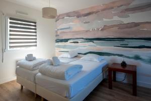 Complexes hoteliers Oasis Les Jardins des Sables d'Olonne : photos des chambres