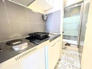 Appartements Studio neuf a 2 pas du metro : photos des chambres