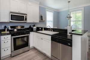 The Sleepy Pup by Seabrook Hospitality