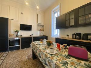 Appartements Le Questel au coeur de la cite romaine avec clim : photos des chambres