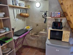 Maisons de vacances Maisonnette dans village medieval - 2 pers - piscine privee & jardin : photos des chambres