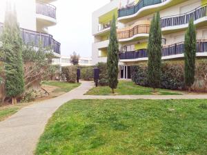 Appartements Grand appartement avec garage et terrasse : photos des chambres