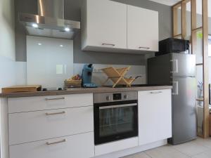 Appartements Les Jardins d'Oc - Wifi, Terrasse et Jardinet - Appart T2 neuf : photos des chambres