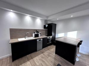 Appartements Charme Manosquins : photos des chambres