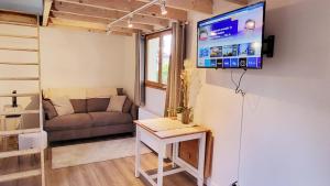 Appartements Le Petit Noisy entre Paris et Disney, proche Centrex avec Jardin privatif et parking : photos des chambres