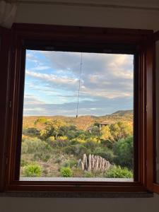 Casa sviluppata su due piani con doppia veranda e parcheggio privato