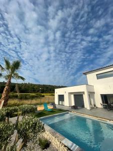 Villas Villa Sud La Cigale des Bois de Maruejols : photos des chambres