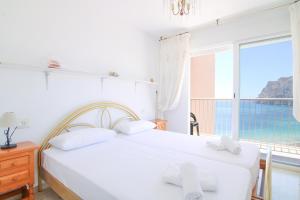 RIURAUHOME - Ático en 1ª línea de playa Calpe