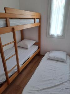 Chalets Chalet de vacances aux abords du lac d'Hourtin : photos des chambres