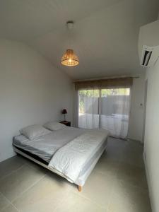 Villas Villa avec piscine, vue degagee sur la foret : photos des chambres