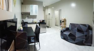 Monarch Parksuites - Balmoral Place (near NAIA, MOA, MOA Arena, DFA) - Hotel 4 stelle a Manila
