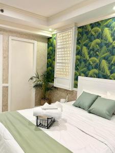 One Bedroom with Balcony by Christine Suites PH in Greenbelt Radisson