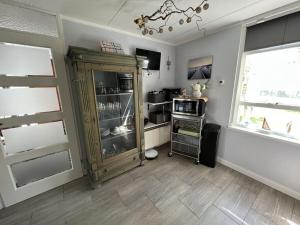 Carpe Diem with jetty and boat