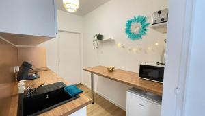 Appartements Cosy Green - T1 - 35 m2 : photos des chambres