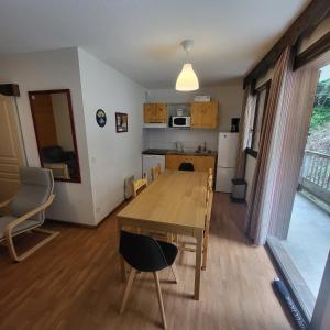 Appartements 3 vallees, piscine et sauna : photos des chambres